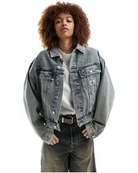 Calvin Klein - Giacca di jeans squadrata lavaggio medio - Lyst