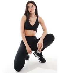 Nike - Nike One Training Wrap Light Support Sports Bra - Lyst