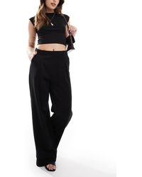 Stradivarius - Pantaloni Sartoriali Con Fondo Ampio Neri - Lyst