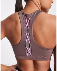 Nike - Nike One Training Indy Novelty Dri Fit Lace Back Light Support Sports Bra - Lyst