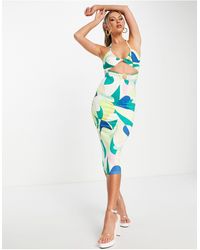 SIMMI - Simmi - robe moulante mi-longue à découpe à la taille et imprimé ondulé - vert - Lyst