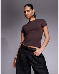 GOOD AMERICAN - Sculpting Baby Tee - Lyst