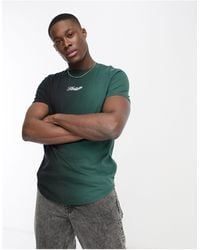 Hollister - X asos – exklusives t-shirt mit schwarz/grünem farbverlauf, zentriertem logo und abgerundetem saum - Lyst