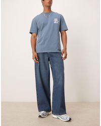 ASOS - – sehr weite jeans mit faltendetails und indigo-waschung - Lyst