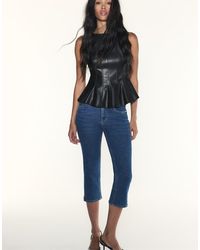 Stradivarius - Sleeveless Leather-Effect Peplum Top - Lyst