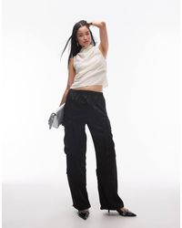 AllSaints - Barbara Satin Utility Trousers - Lyst