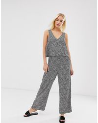 soaked in luxury paloma jumpsuit