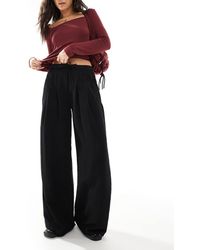 Stradivarius - Broek Met Wijde Pijpen En Gestrikte Taille - Lyst