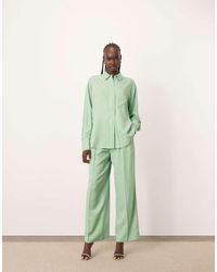 ARRANGE - Pantaloni A Fondo Ampio Color Pistacchio Con Cuciture A Contrasto - Lyst