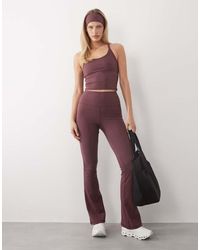 4505 - Icon High Waist Slim Kick Yoga leggings - Lyst