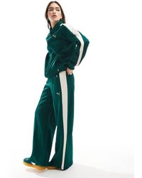 PUMA - Pantalones De Chándal De Talle Bajo T7 De (Parte De Un Conjunto) - Lyst