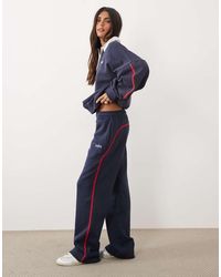 Kaiia - Cotton Rich Embroidered Logo Detail Side Stripe Wide Leg Joggers Co-Ord - Lyst