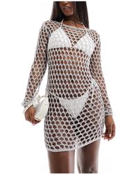 In The Style - Metallic Crochet Long Sleeve Scoop Back Mini Beach Dress - Lyst