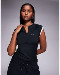 Nike - – ärmelloses, figurbetontes oberteil - Lyst