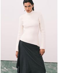 Pretty Lavish - Ribbed Knit Roll Neck Asymmetric Hem Top - Lyst