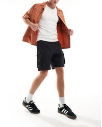 Bershka - Short Van Nylon Met Cargozakken - Lyst