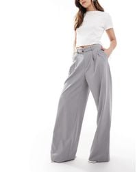 Stradivarius - Pantalon ample et ajusté avec ceinture - Lyst