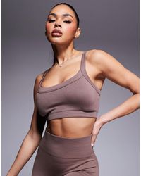 4505 - Sculpting Seamless Medium Support Sports Bra - Lyst