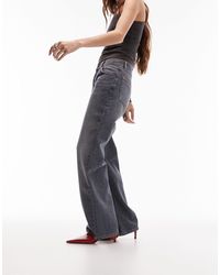 TOPSHOP - Ember - jeans a fondo ampio e vita bassa fumo - Lyst