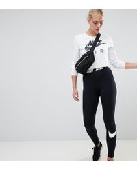 Nike Leggings neri a vita alta con elastico a contrasto - Nero