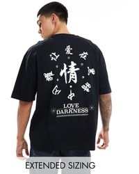 ASOS - Camiseta negra extragrande con estampado blanco estilo sukajan - Lyst