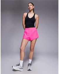 4505 - Icon Woven Run Short With Zip Pockets - Lyst