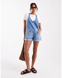 Pull&Bear - – latz-playsuit aus blauem denim - Lyst