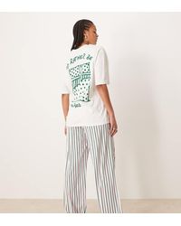 ASOS - Pijama Extragrande De Pantalones A Rayas De Pernera Ancha Y Camiseta Con Estampado Gráfico De Cama De Asos Design Tall-Verde - Lyst