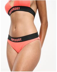 Superdry - – elastische bikinihose - Lyst