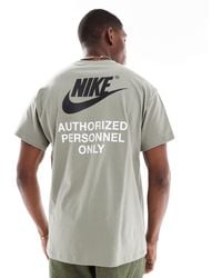 Nike - T-shirt avec imprimé et logo virgule au dos - kaki - Lyst