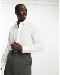 Versace - Camicia bianca a maniche lunghe con logo - Lyst
