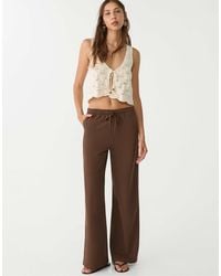 Stradivarius - – lange, elegante hose aus weich fallendem stoff - Lyst