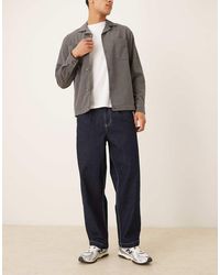 ASOS - Relaxed Tapered Fit Jeans With Pleat Detail - Lyst