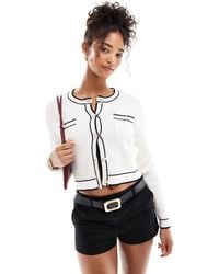 Morgan - Gilet boutonné en maille avec bords contrastants - crème - Lyst
