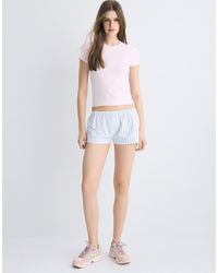 Stradivarius - Striped Buttoned Mini Shorts - Lyst