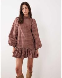 Ghospell - High Neck Balloon Sleeve Ruffle Hem Mini Dress - Lyst