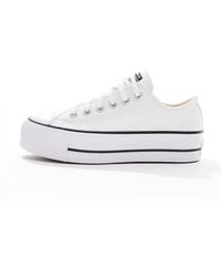 Converse - Chuck taylor all star lift ox - baskets larges à semelle plateforme compensée - Lyst