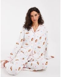 Loungeable - Ensemble pyjama chemise boutonnée à col tailleur et pantalon imprimé croissants et nœuds - Lyst