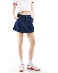 Stradivarius - Str Pleated Denim Mini Skirt - Lyst