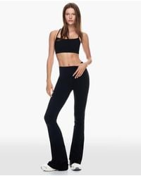 Bershka - Pantaloni A Zampa Tecnici Neri - Lyst