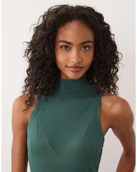 ASOS - Fijn Geribde Hoogsluitende Mouwloze Tanktop - Lyst