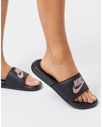 women's nike benassi slides