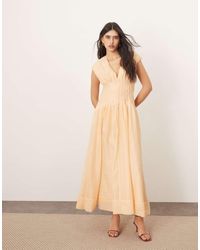 ARRANGE - Vestido Largo Con Cintura Plisada Y Detalle De Lazada En La Espalda De Organza De -Naranja - Lyst