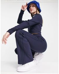 adidas Originals - Retro luxury - pantalon évasé côtelé - bleu foncé - Lyst
