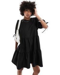 Monki - Short Sleeve Mini Tiered Dress With Bow Detail - Lyst