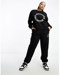 ASOS - Curve Co-ord Oversized jogger With Logo - Lyst