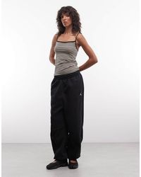 Nike - Brooklyn Cuffed joggers - Lyst