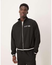 ASOS - Chaqueta De Chándal Negra Extragrande De Piqué De - Lyst