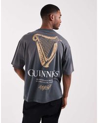 ASOS - Oversized Tee With Guinness Print - Lyst