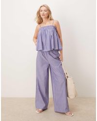 ASOS - Pantalon d'ensemble rayé à taille froncée - bleu/rouge - Lyst